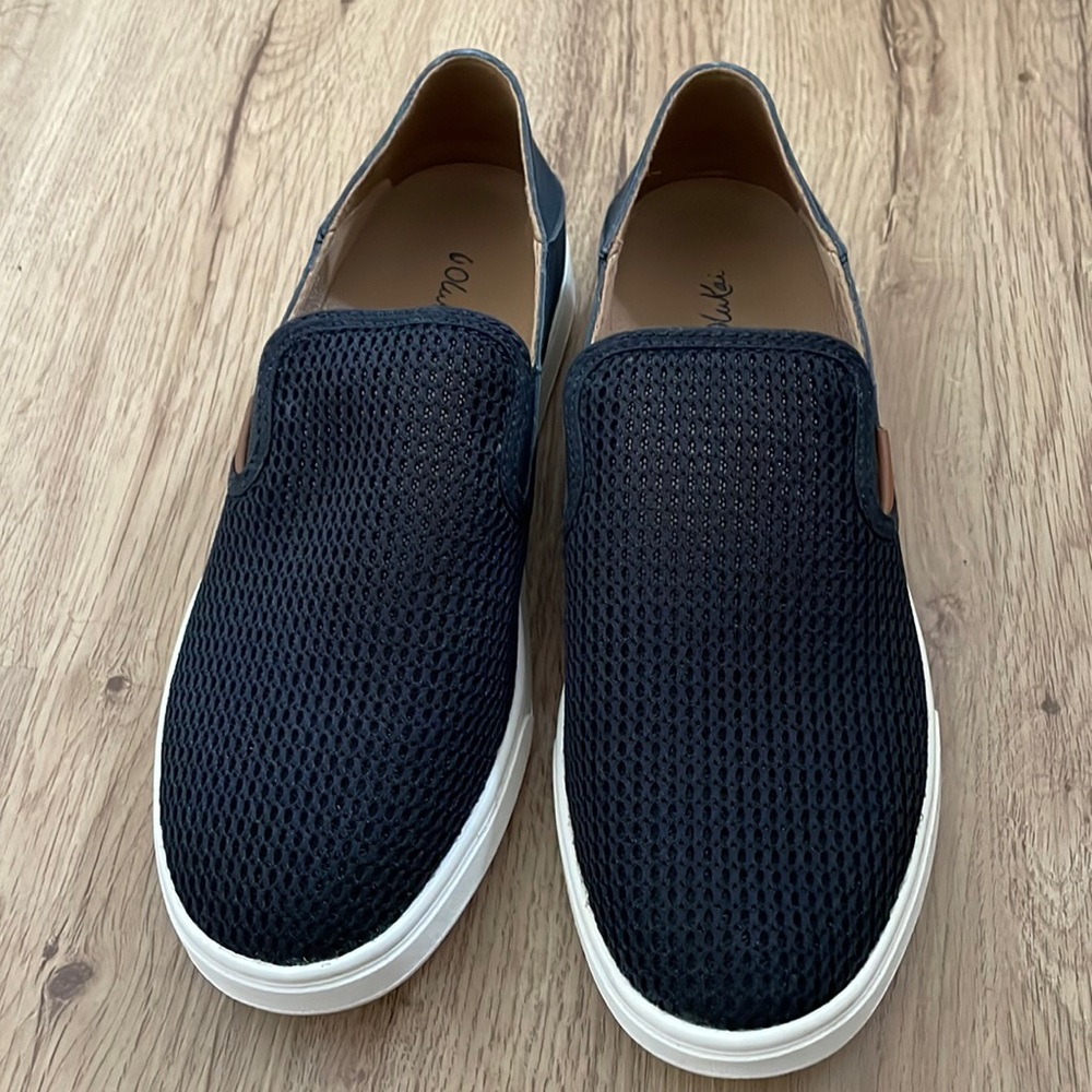 Brand new, never worn, Olukai slide on shoes